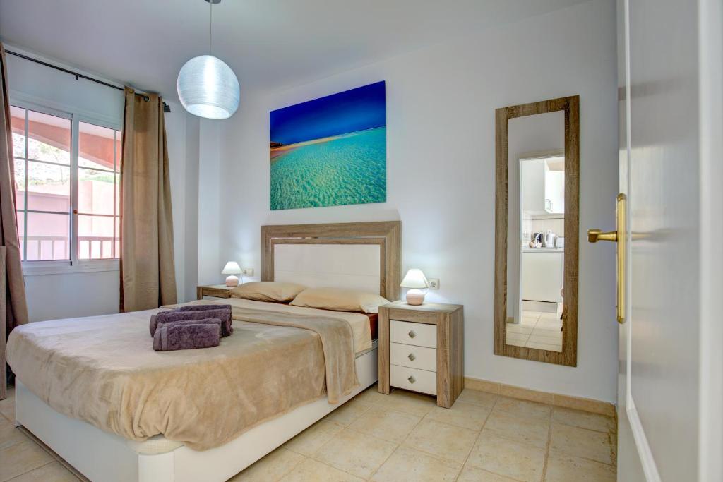 Postel nebo postele na pokoji v ubytování Your Ocean Suite