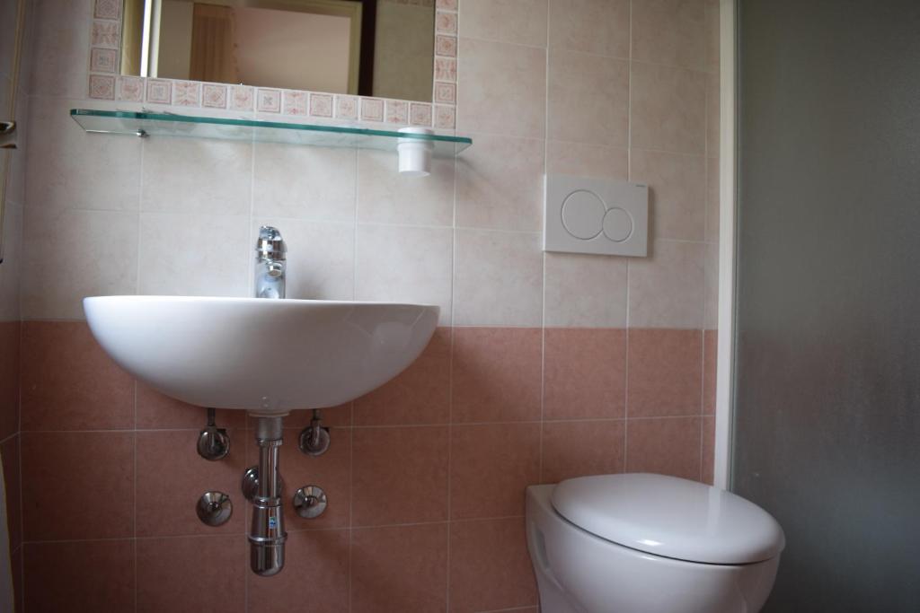 Koupelna v ubytování Hotel Calypso