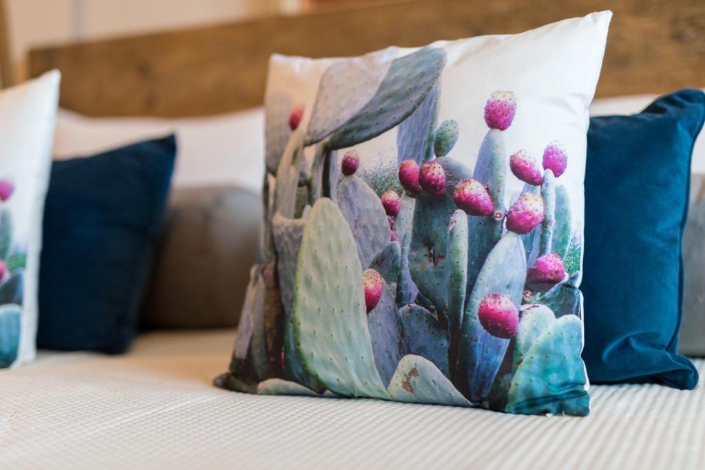 Postel nebo postele na pokoji v ubytování Love & Fama Hotel