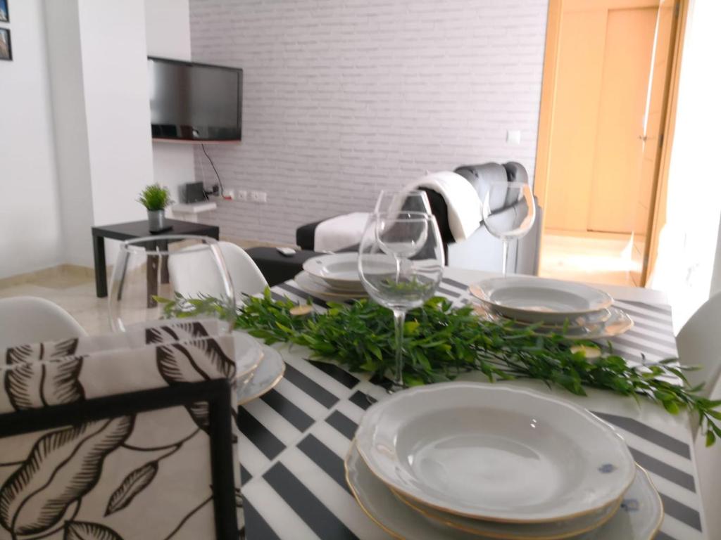 A television and/or entertainment centre at Apartamento La Victoria