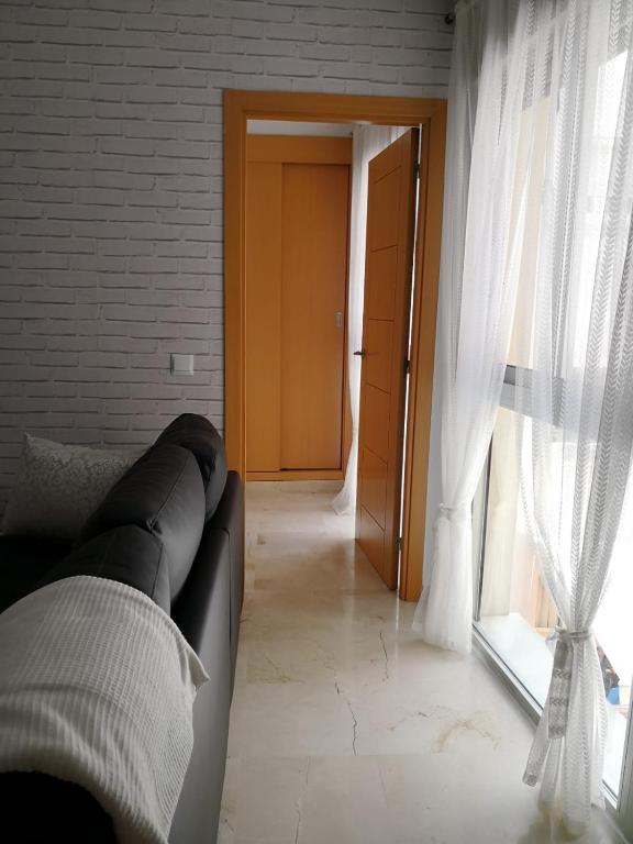 A seating area at Apartamento La Victoria