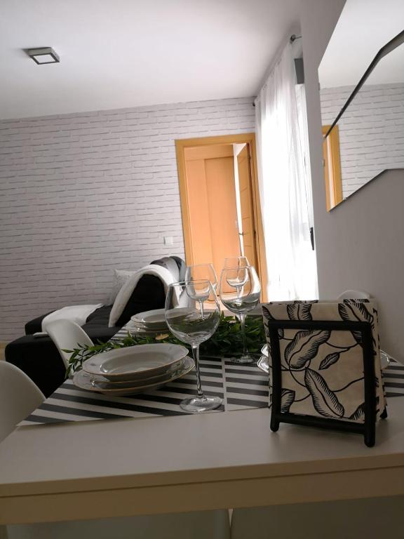 A bed or beds in a room at Apartamento La Victoria