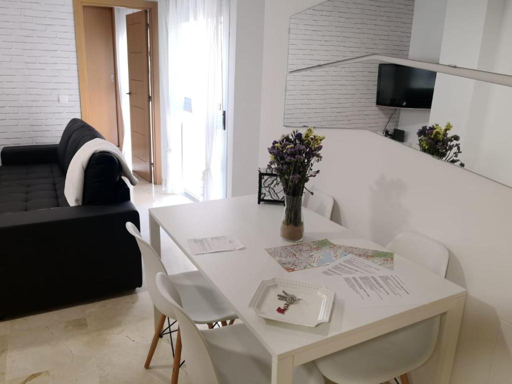 A television and/or entertainment centre at Apartamento La Victoria