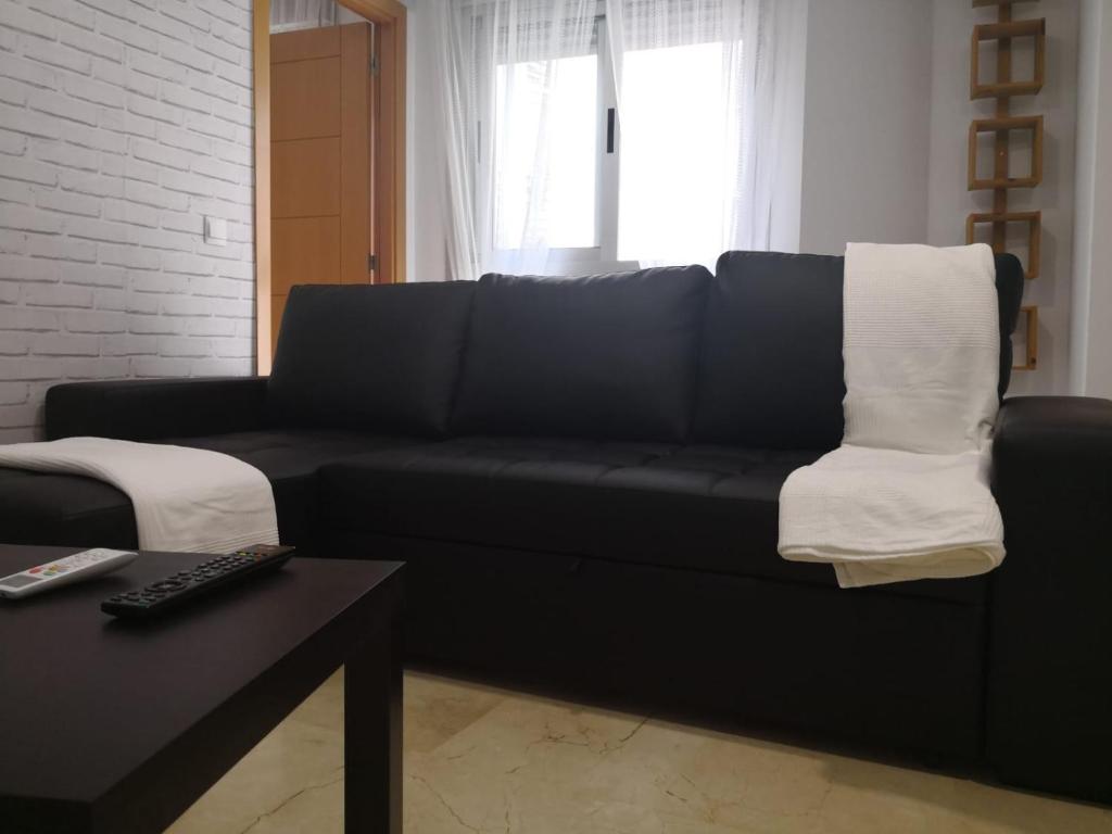 A seating area at Apartamento La Victoria