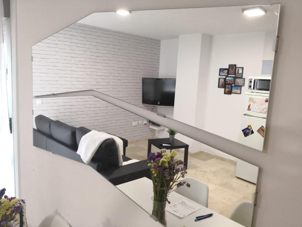A television and/or entertainment centre at Apartamento La Victoria