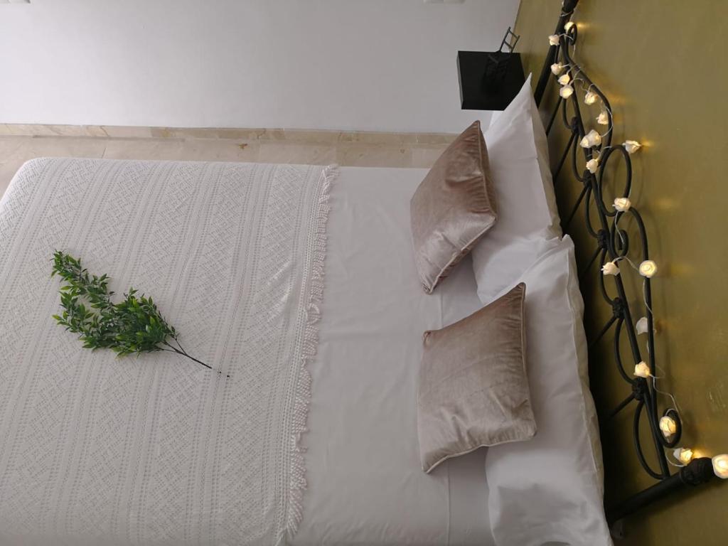A bed or beds in a room at Apartamento La Victoria