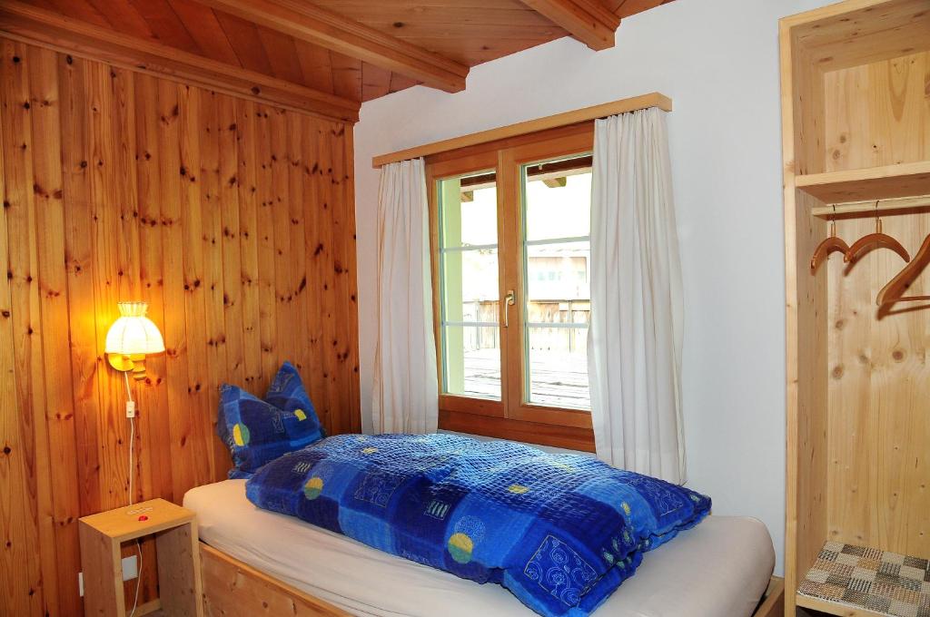 Postel nebo postele na pokoji v ubytování Berggasthaus Gemsli