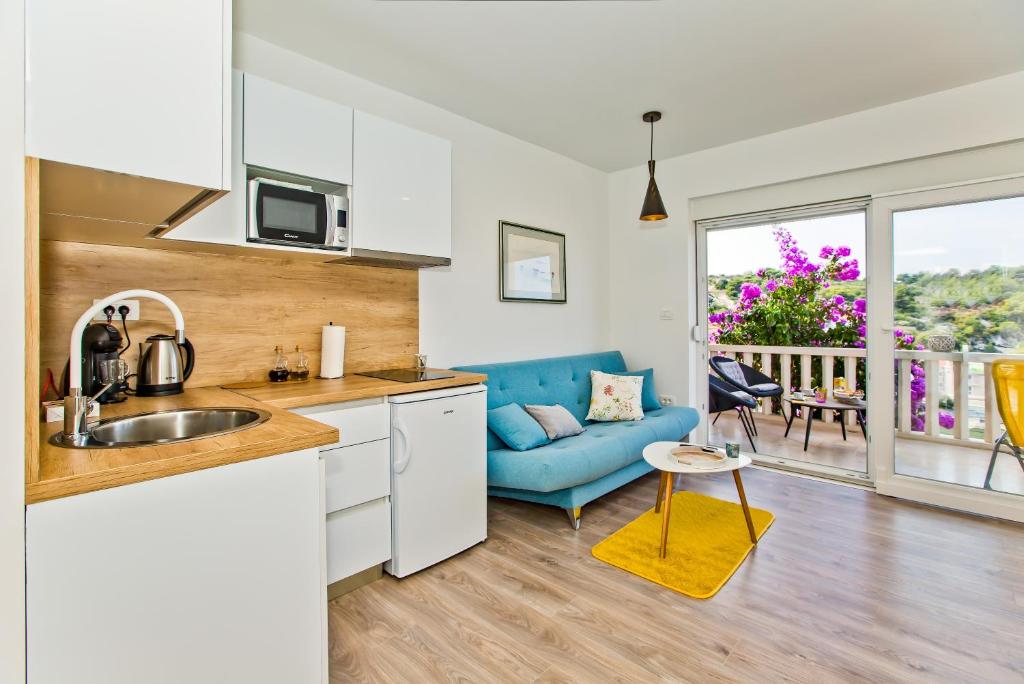 Kuchyň nebo kuchyňský kout v ubytování Apartments Juric