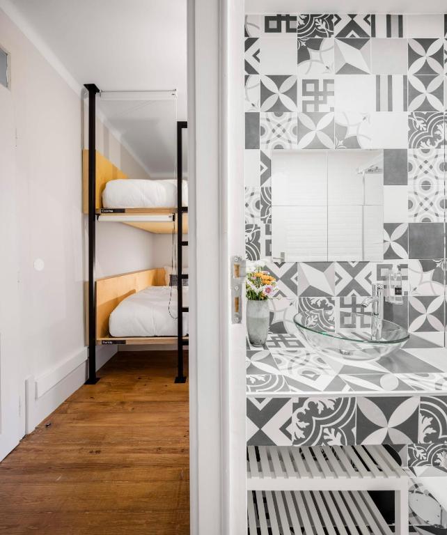 Postel nebo postele na pokoji v ubytování Penedo da Saudade Suites & Hostel