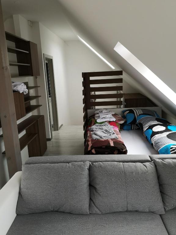 Postel nebo postele na pokoji v ubytování Centrum Apartman S- dom