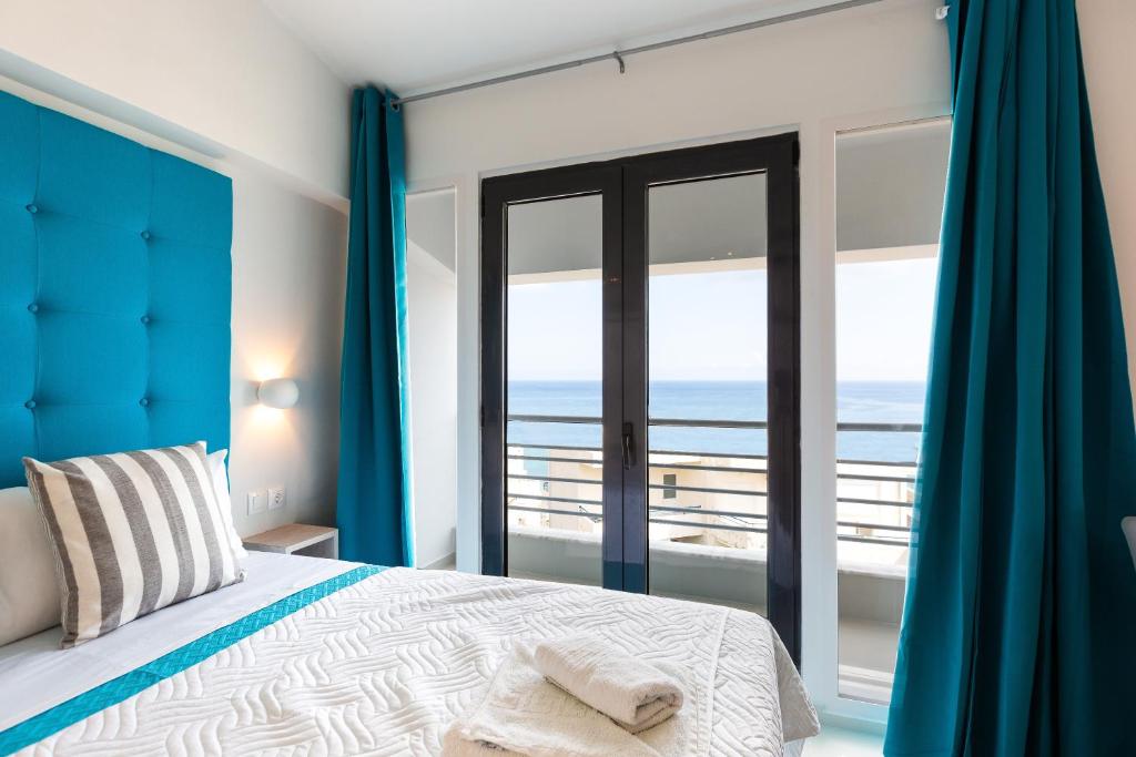 Posteľ alebo postele v izbe v ubytovaní Rethymno Hills Apartments