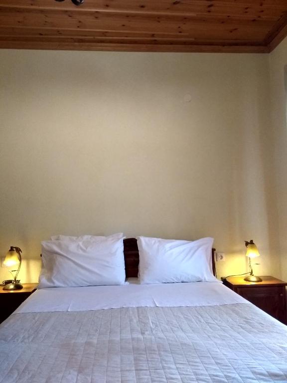 Postel nebo postele na pokoji v ubytování Nimbus Guesthouse