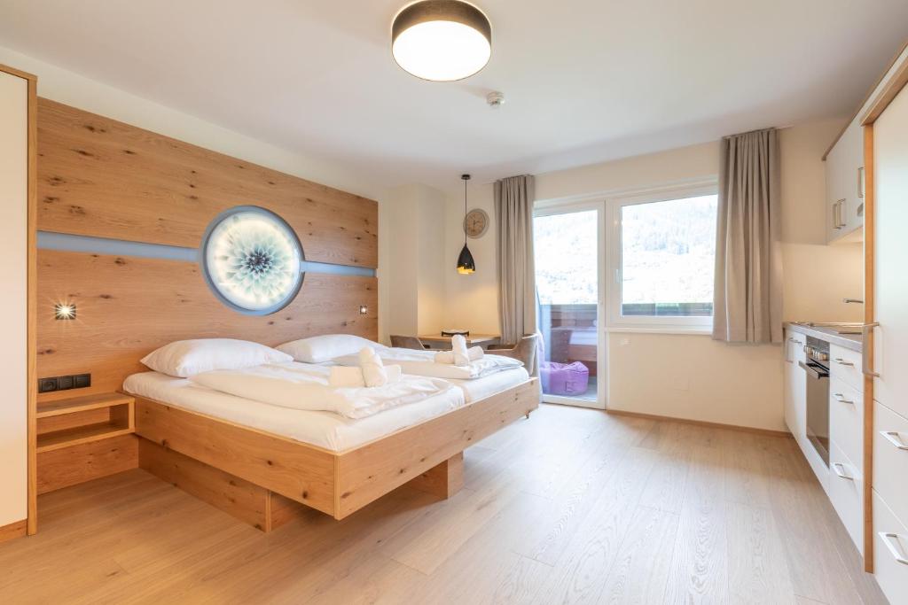 Postel nebo postele na pokoji v ubytování ''die Bergerin'' | Appartements Schladming
