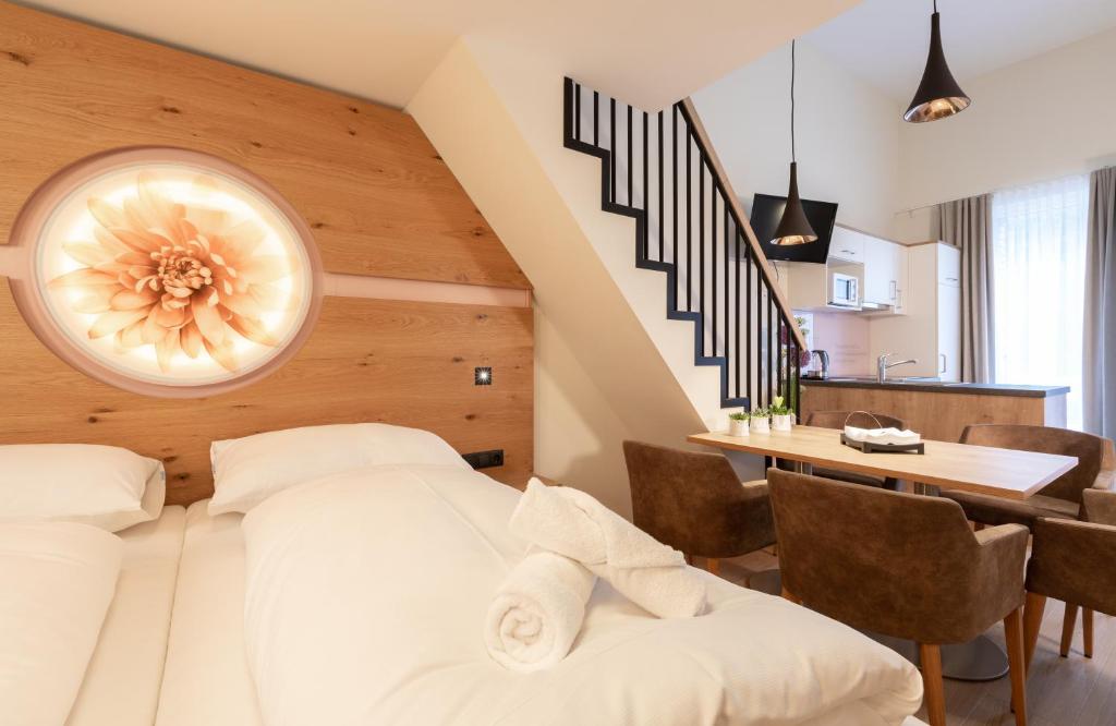 Postel nebo postele na pokoji v ubytování ''die Bergerin'' | Appartements Schladming