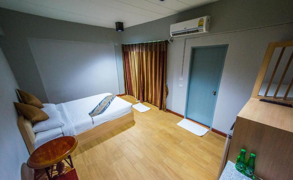 Postel nebo postele na pokoji v ubytování Na Siri Lake View