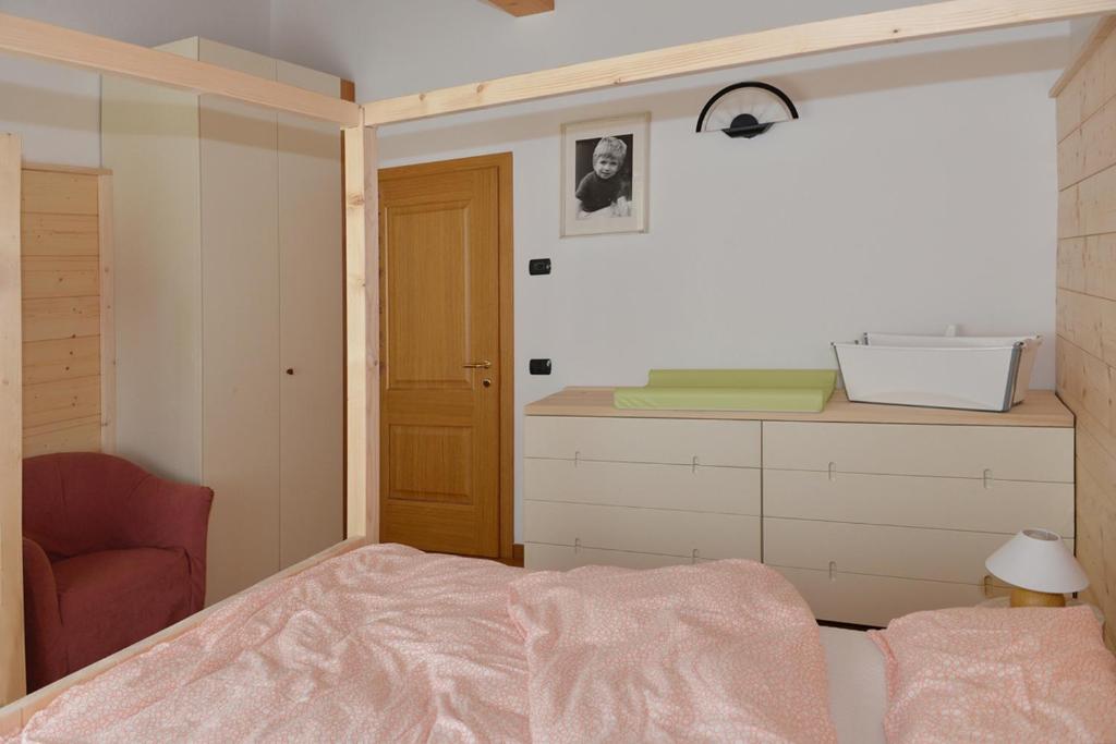 Postel nebo postele na pokoji v ubytování Andalo Chalet