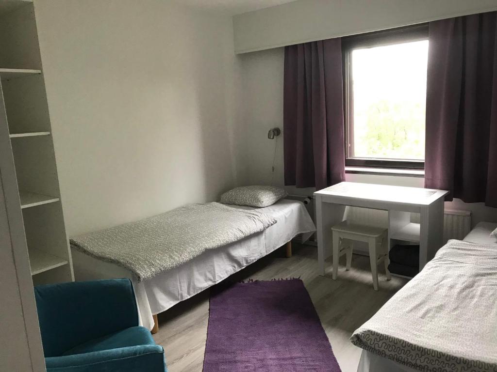 Postel nebo postele na pokoji v ubytování Guesthouse Borealis