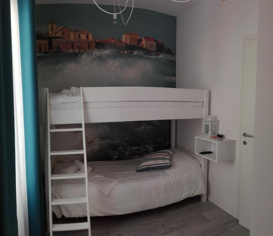 Postel nebo postele na pokoji v ubytování Lyria