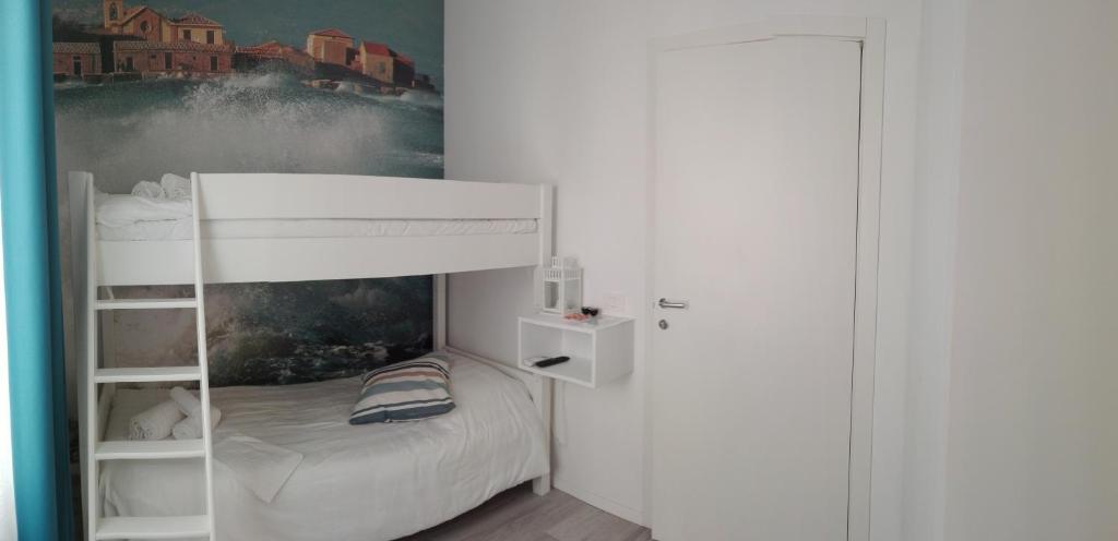 Postel nebo postele na pokoji v ubytování Lyria