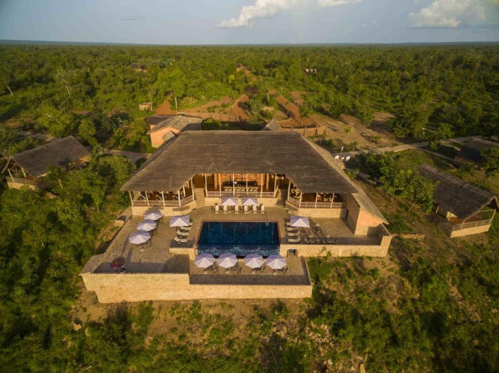 an aerial view of a house with a swimming pool at Zaina Lodge in Mole