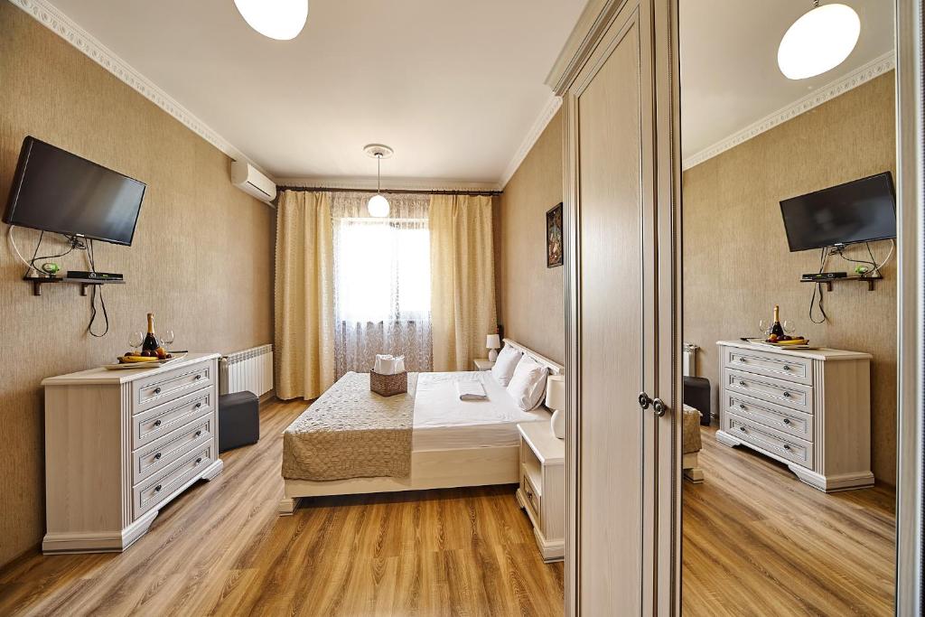 Postel nebo postele na pokoji v ubytování Hotel Fusion