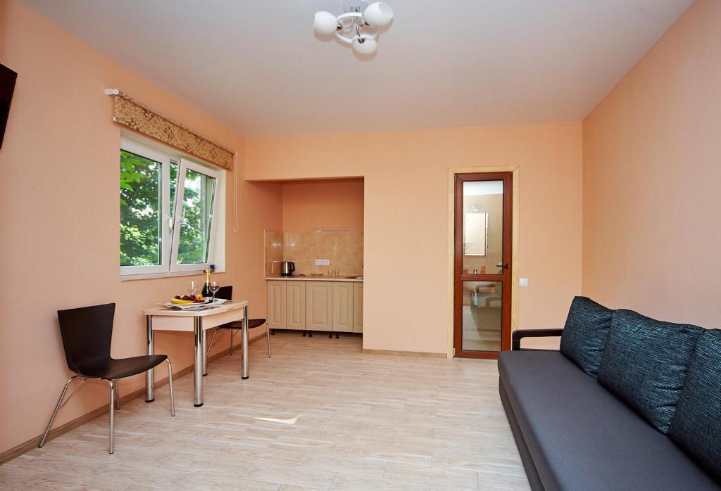Kuchyň nebo kuchyňský kout v ubytování Hotel Fusion