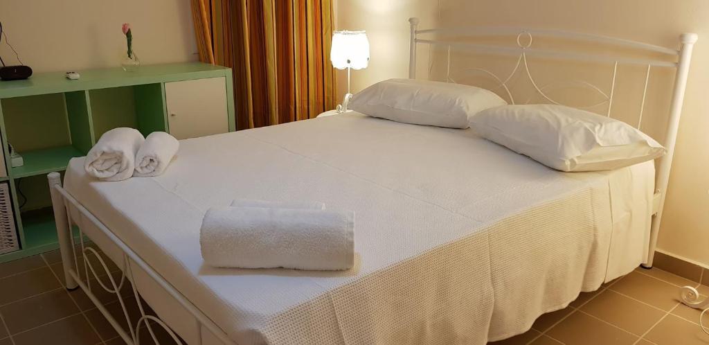 Postel nebo postele na pokoji v ubytování Villa Canella