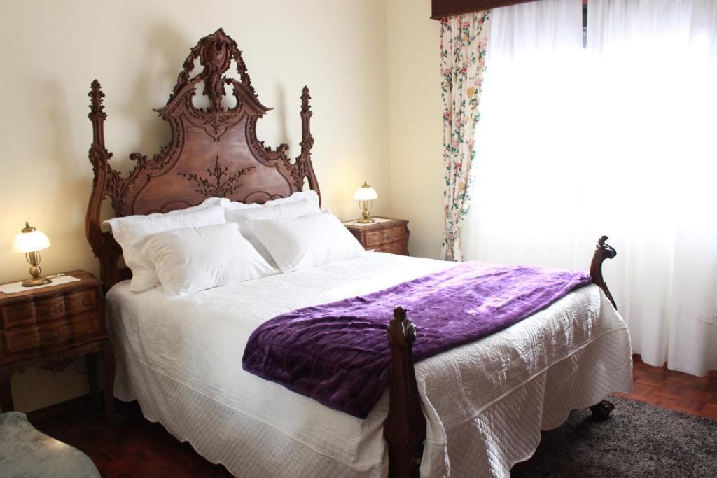 Postel nebo postele na pokoji v ubytování Graciosa Guest House