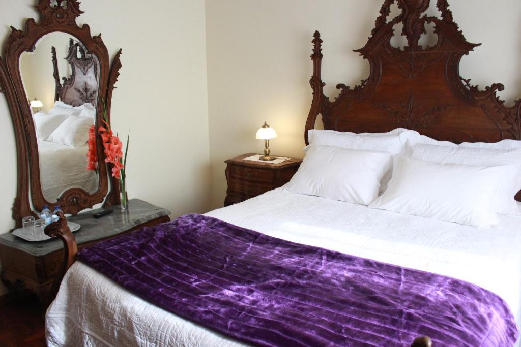 Postel nebo postele na pokoji v ubytování Graciosa Guest House