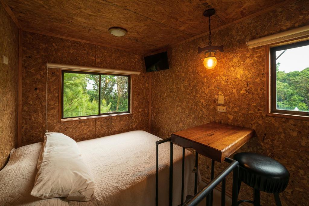 Postel nebo postele na pokoji v ubytování Altura Hotel