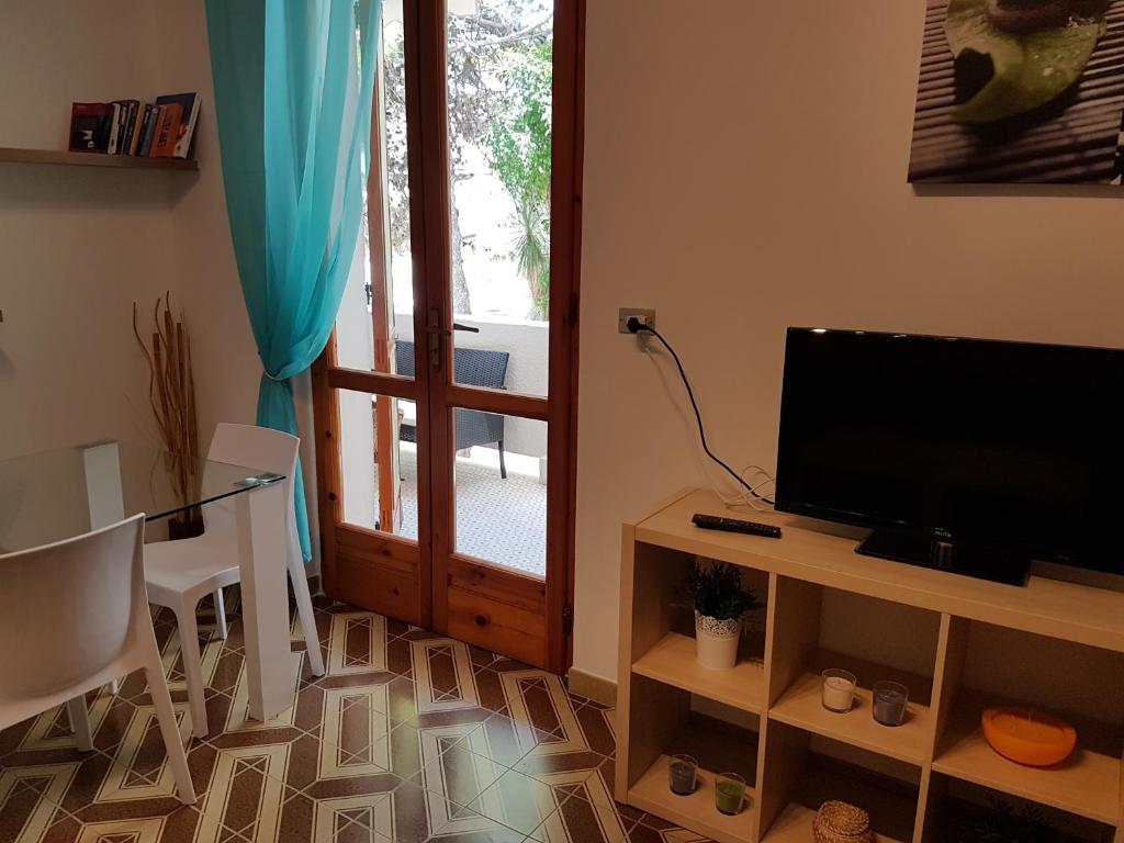 TV a/nebo společenská místnost v ubytování Residence Orsa Minore