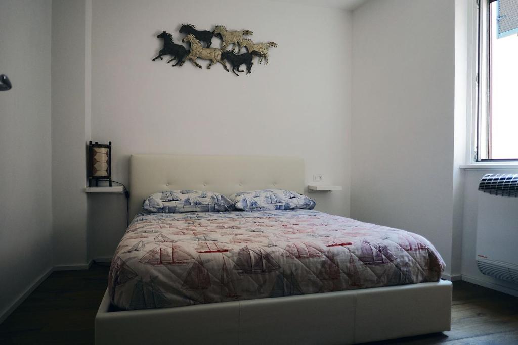 Postel nebo postele na pokoji v ubytování Marina Apartments
