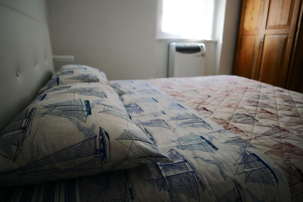 Postel nebo postele na pokoji v ubytování Marina Apartments