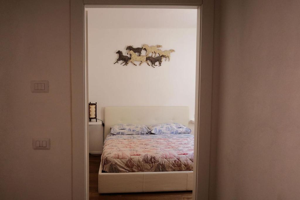 Postel nebo postele na pokoji v ubytování Marina Apartments