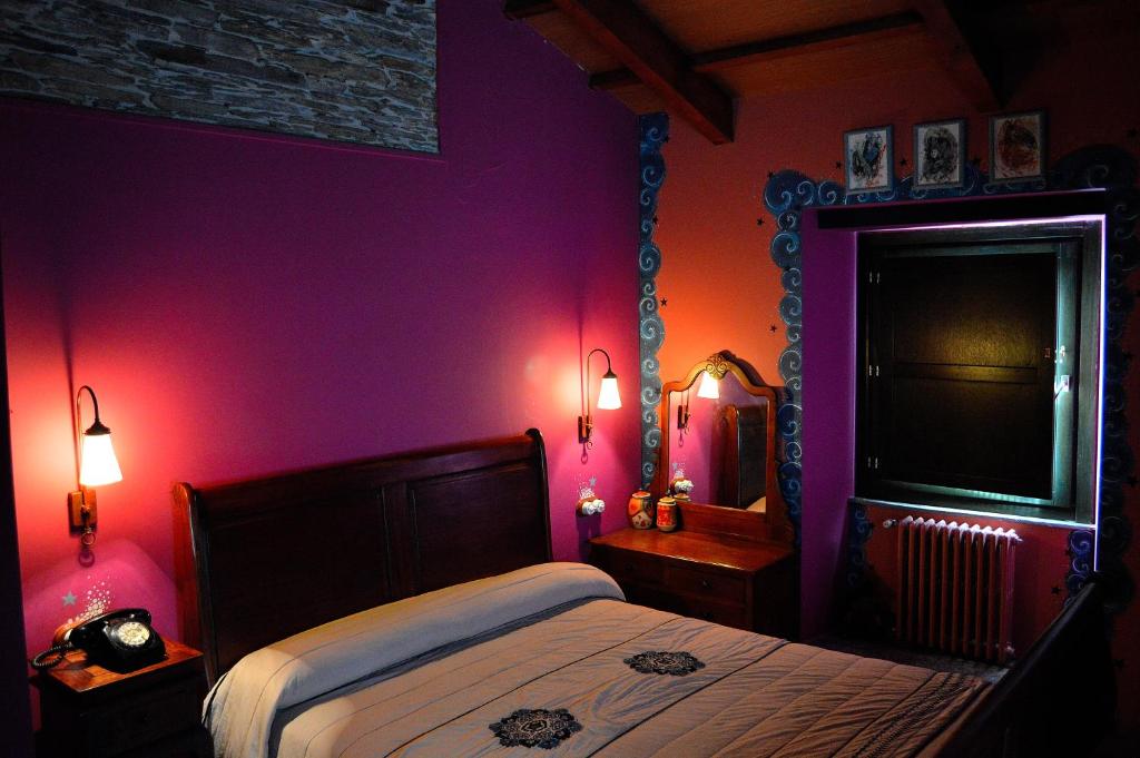 Postel nebo postele na pokoji v ubytování Casa de Baixo