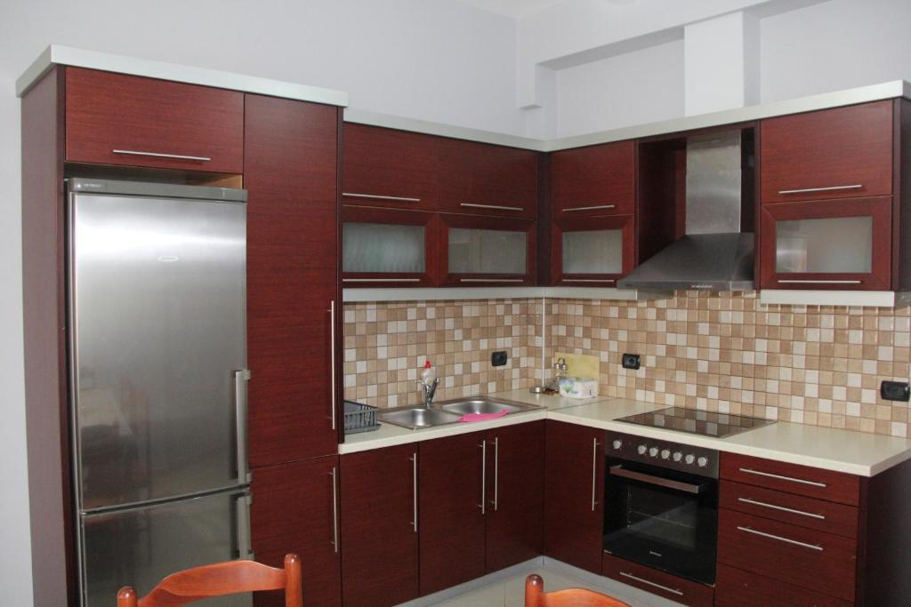 O bucătărie sau chicinetă la Zero Zero Apartments Sarande