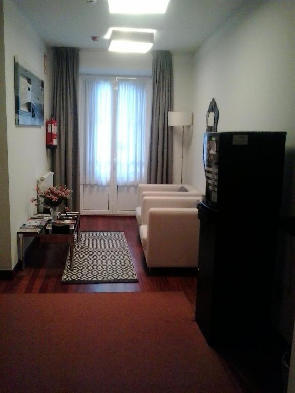 Posteľ alebo postele v izbe v ubytovaní Hostal San Sebastian Centro