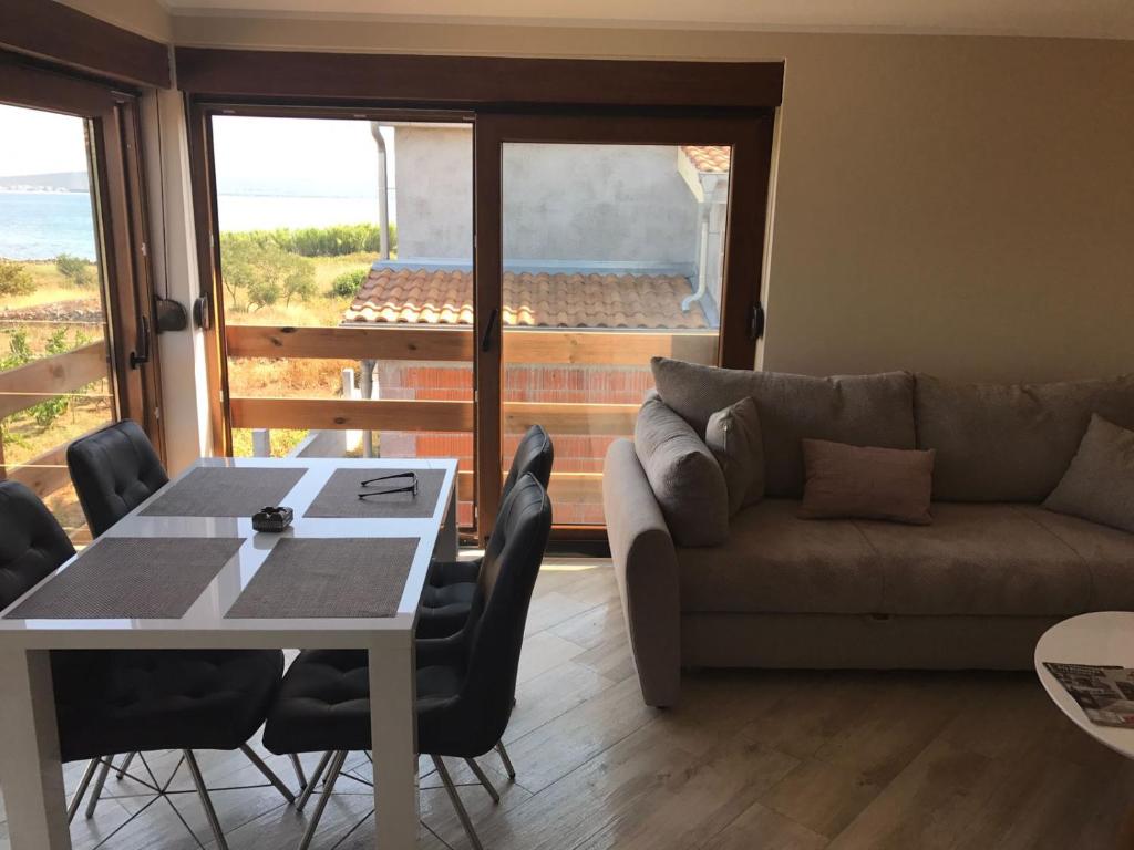 Posedenie v ubytovaní Masanda Luxury Apartments