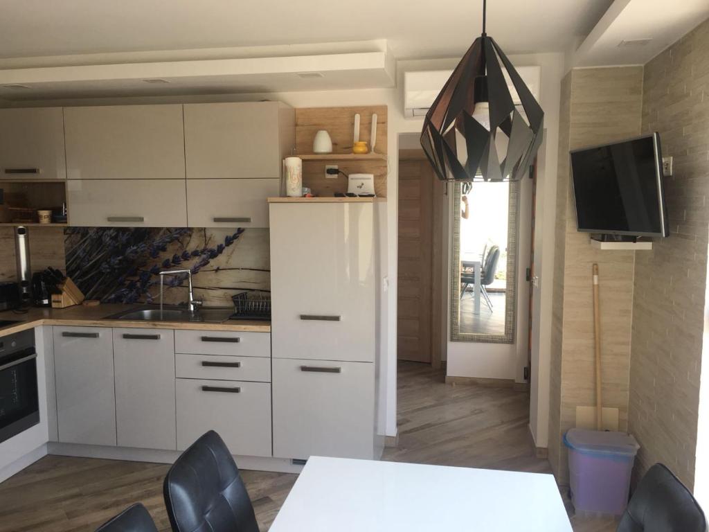 Kuchyňa alebo kuchynka v ubytovaní Masanda Luxury Apartments