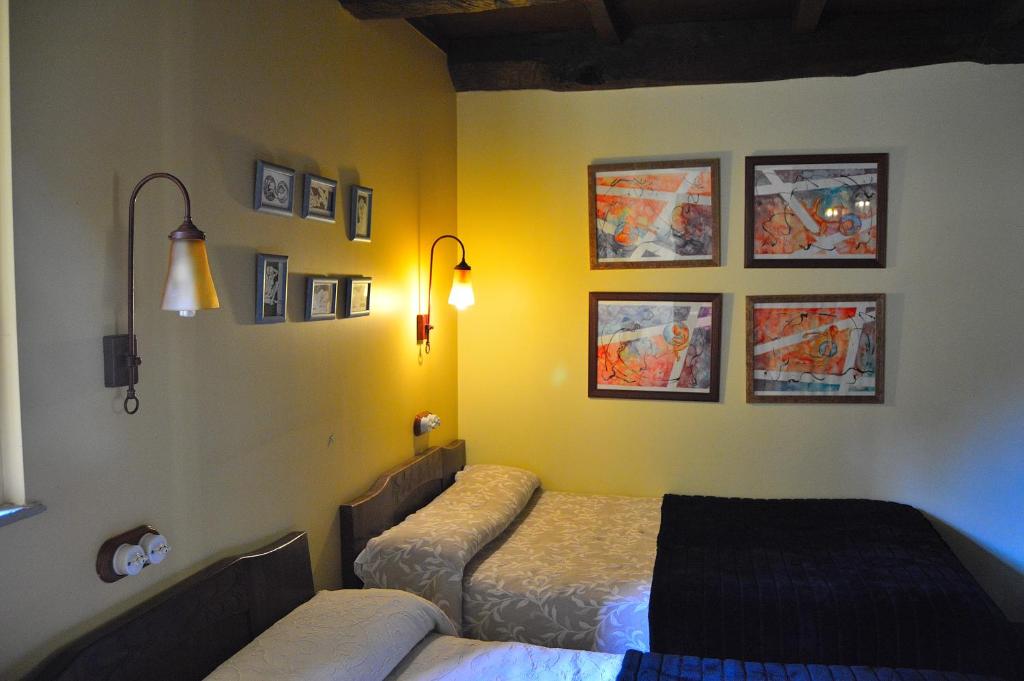 Postel nebo postele na pokoji v ubytování Casa de Baixo