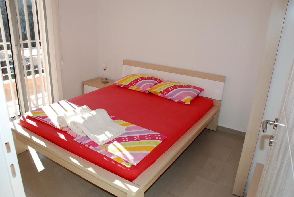 Postel nebo postele na pokoji v ubytování Montesun Residence