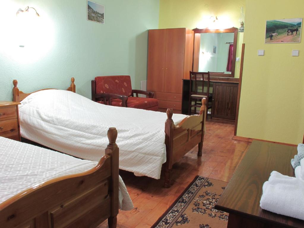 Postel nebo postele na pokoji v ubytování Manis Hotel