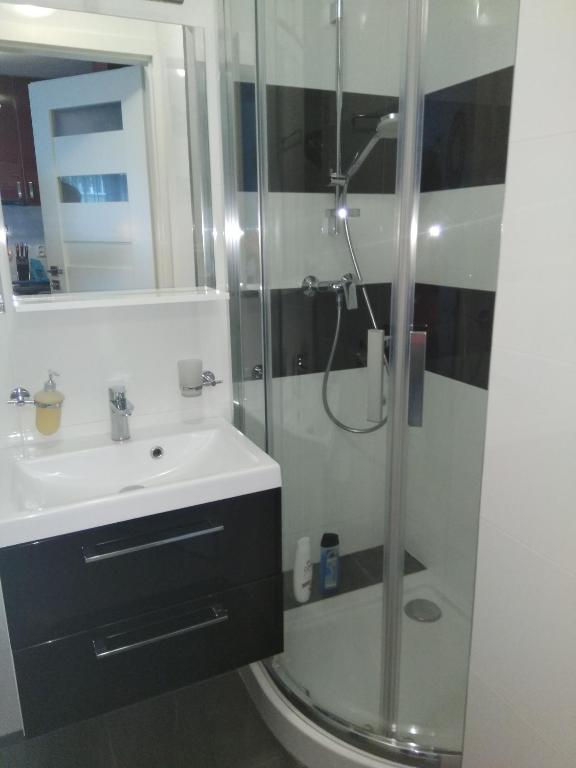 Kúpeľňa v ubytovaní CHERRY APARTAMENT W ŚCISŁYM CENTRUM