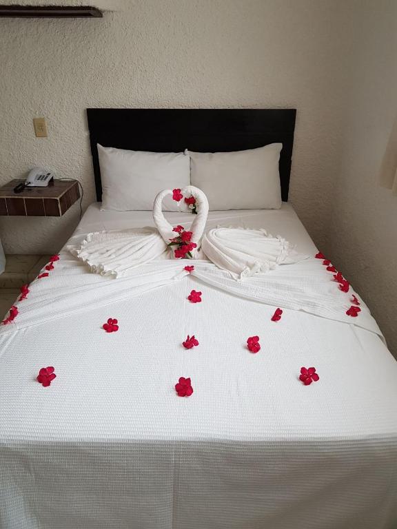 Postel nebo postele na pokoji v ubytování Hotel Carrillos Cancun