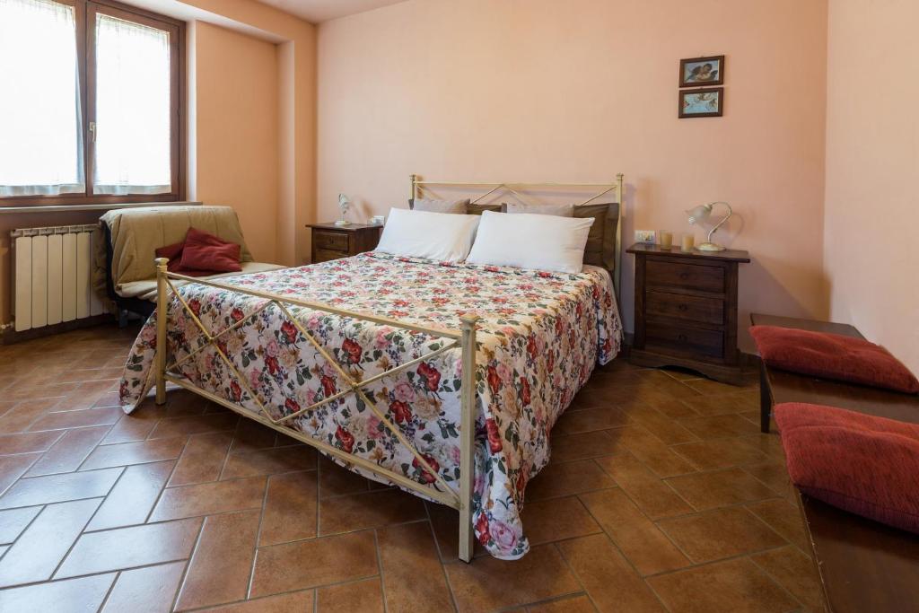 Postel nebo postele na pokoji v ubytování Country House Nonna Rana