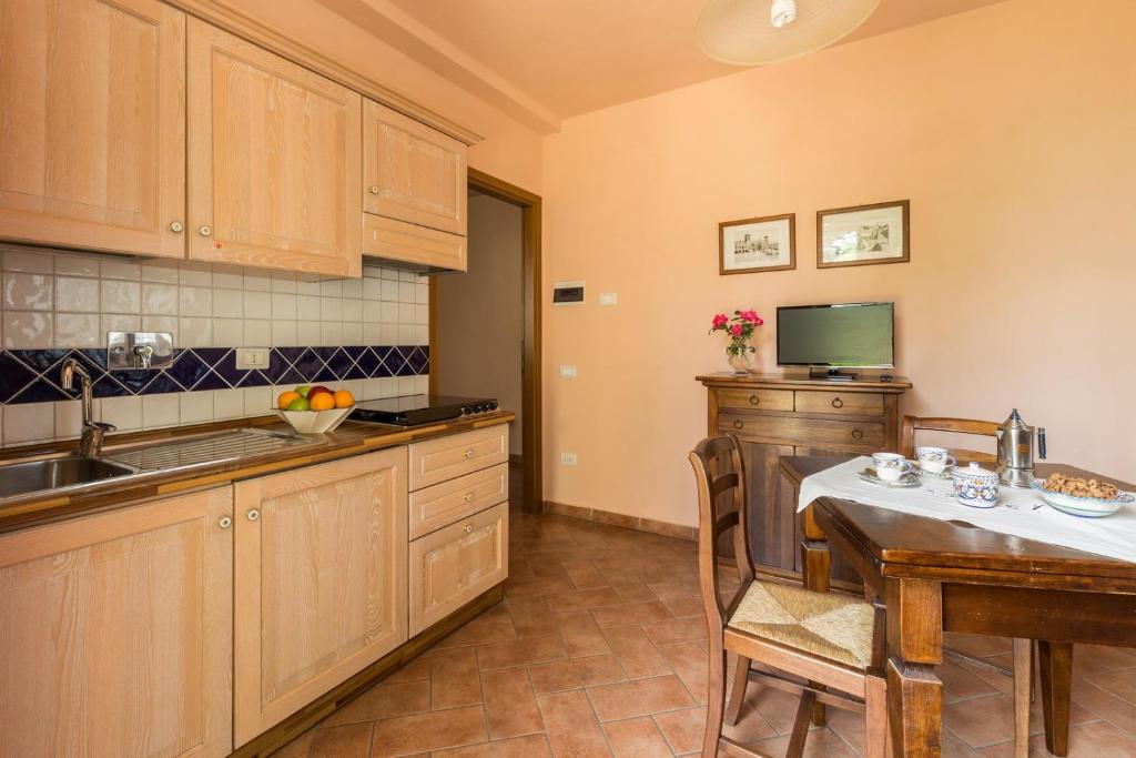 Kuchyň nebo kuchyňský kout v ubytování Country House Nonna Rana