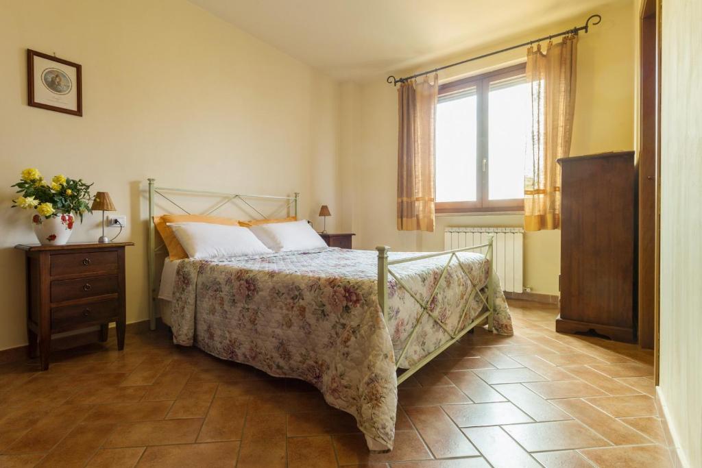 Postel nebo postele na pokoji v ubytování Country House Nonna Rana