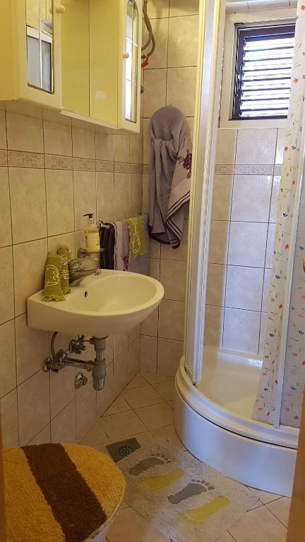 Kúpeľňa v ubytovaní Rooms Roza