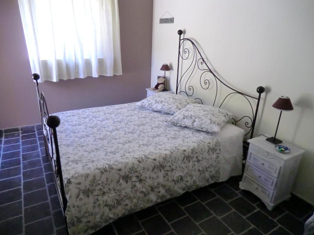 Postel nebo postele na pokoji v ubytování La Bastide de Fontaille