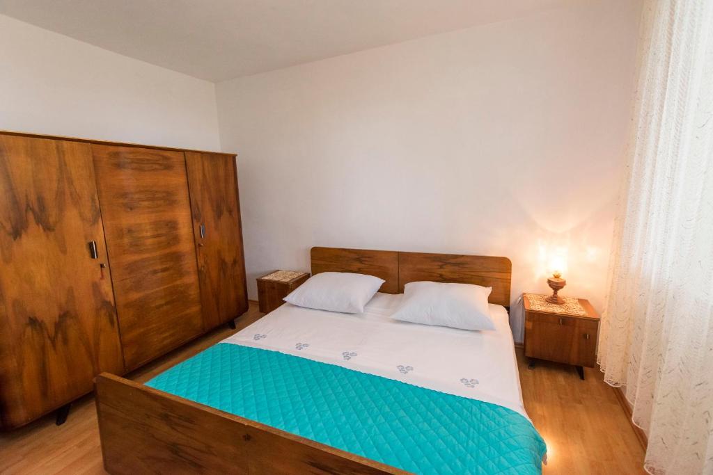 Postel nebo postele na pokoji v ubytování Apartment Anka